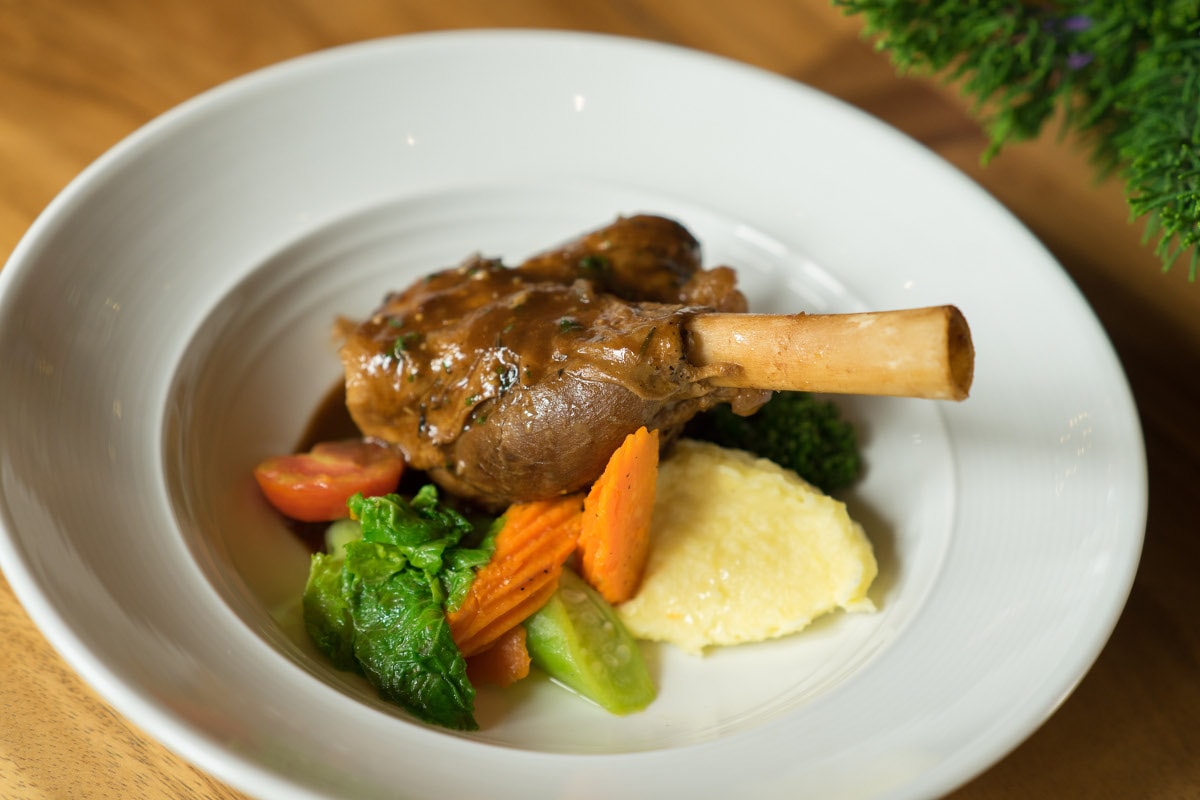 Roasted lamb shank with side dish